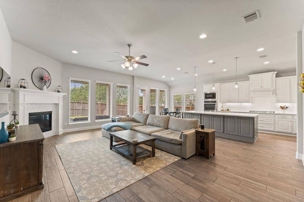 Open great room concept with stunning wall of windows!