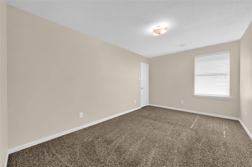 One of four bedrooms upstairs.