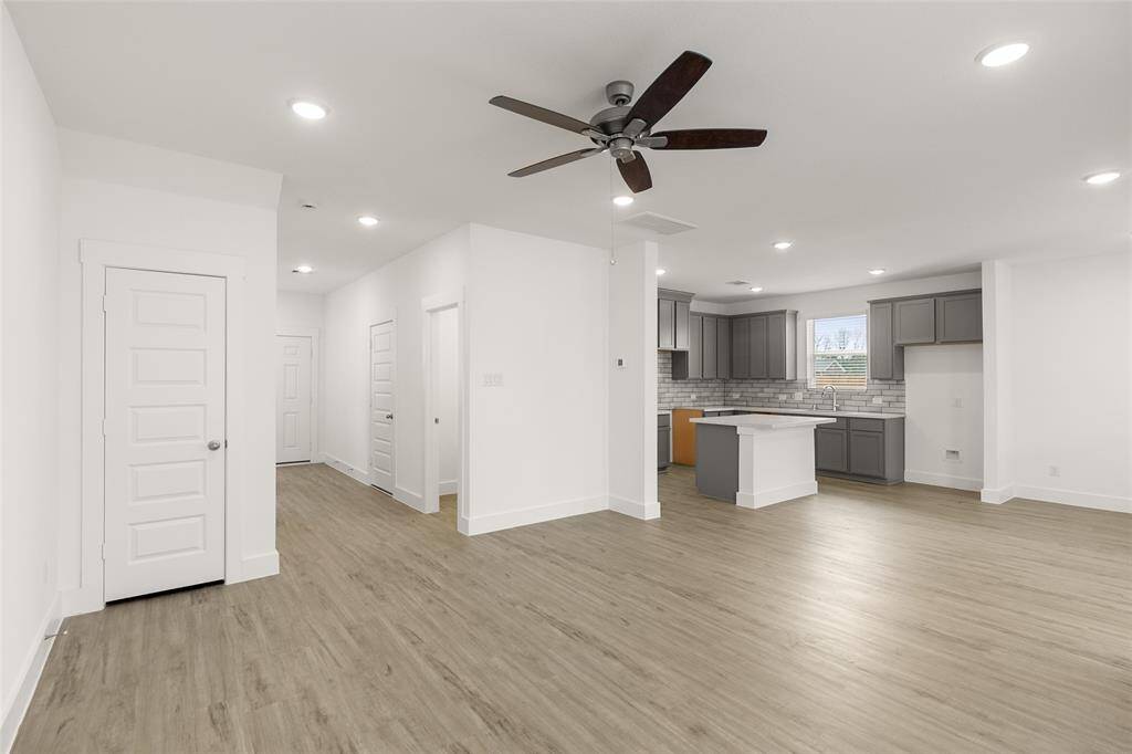 As you wander through the open floor plan, you’ll notice high ceilings that elevate the ambiance, while carefully chosen materials add a touch of luxury without losing that cozy feel.