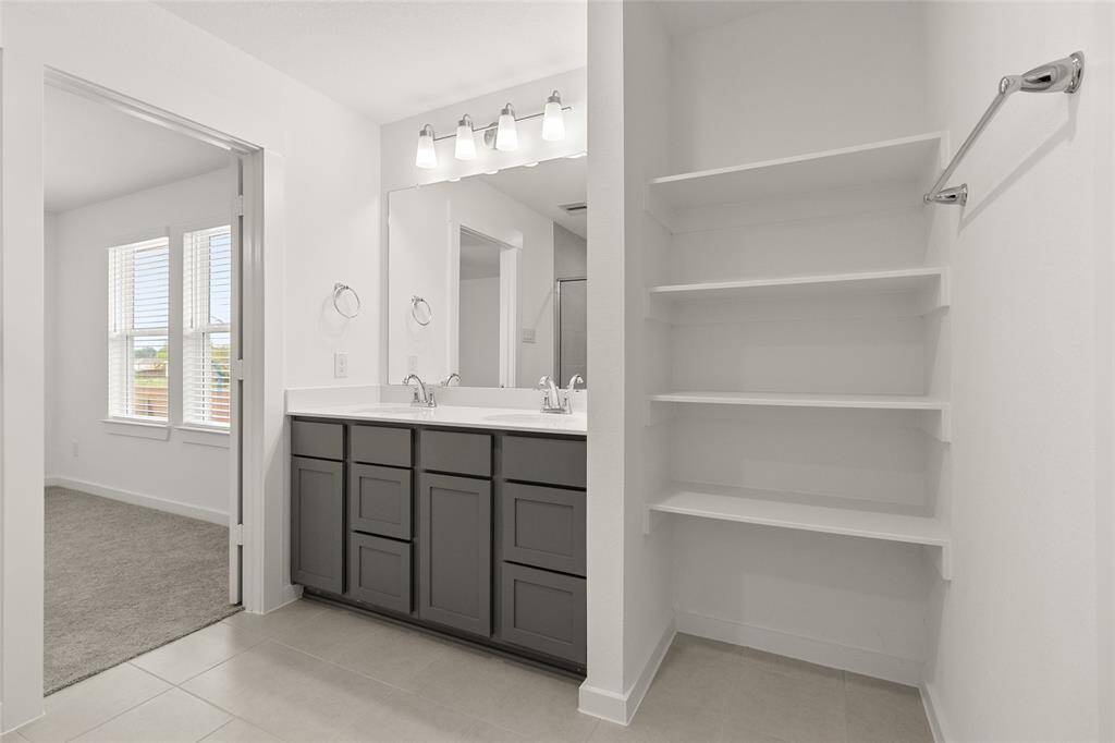 With thoughtful storage solutions tucked away, everything you need is at your fingertips, while maintaining a clean, uncluttered look.