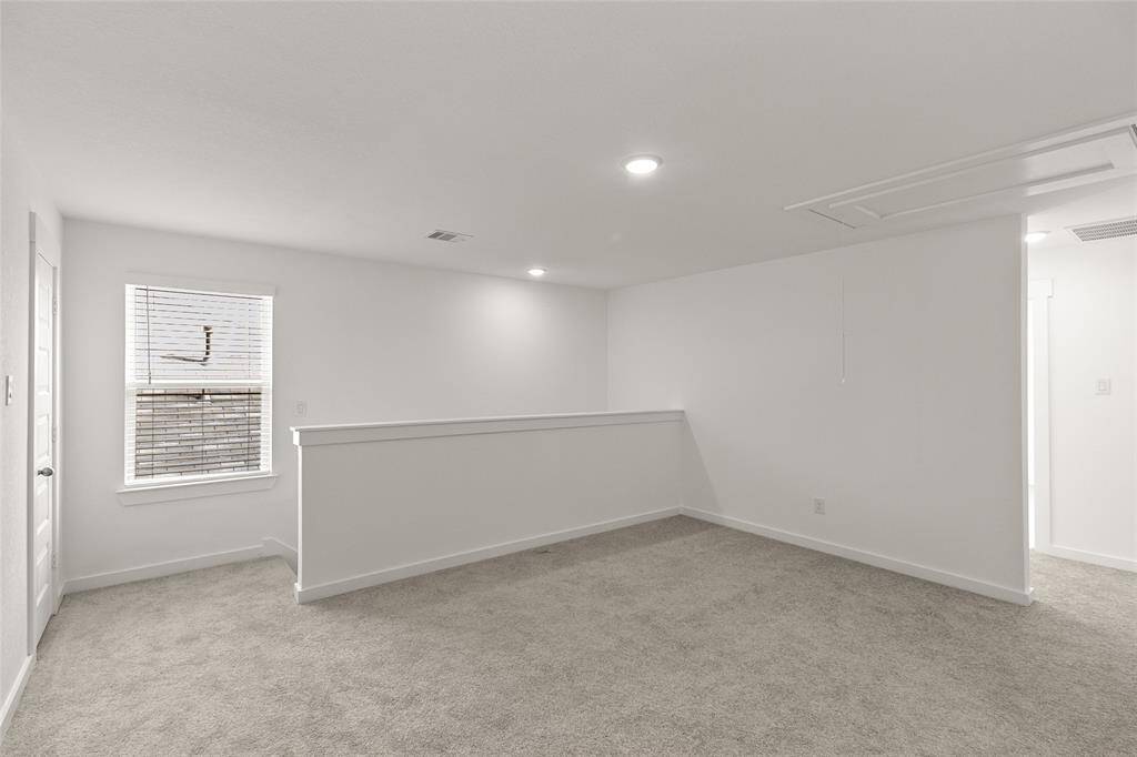 The versatility of this room means it can easily shift from a playroom for the kids to a serene yoga studio where you can unwind after a long day.