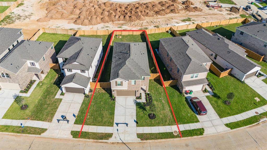 Amazing aerial shot of this gorgeous KB Home home situated on a large lot with lush landscaping in the front and back.
