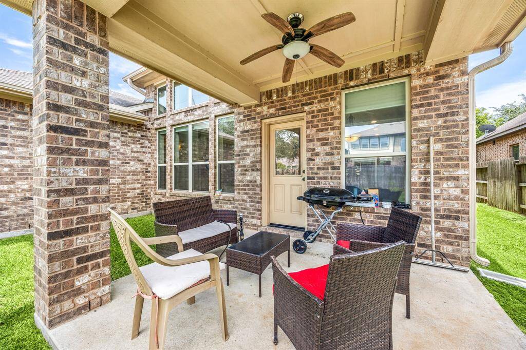 Come and see this spacious backyard with its beautiful covered patio and paved walkway down the side yard. There is plenty of room for the kids to play and adults to relax! Perfect for your outdoor living space, patio furniture, bbq pit, and so much more. The possibilities are endless!
