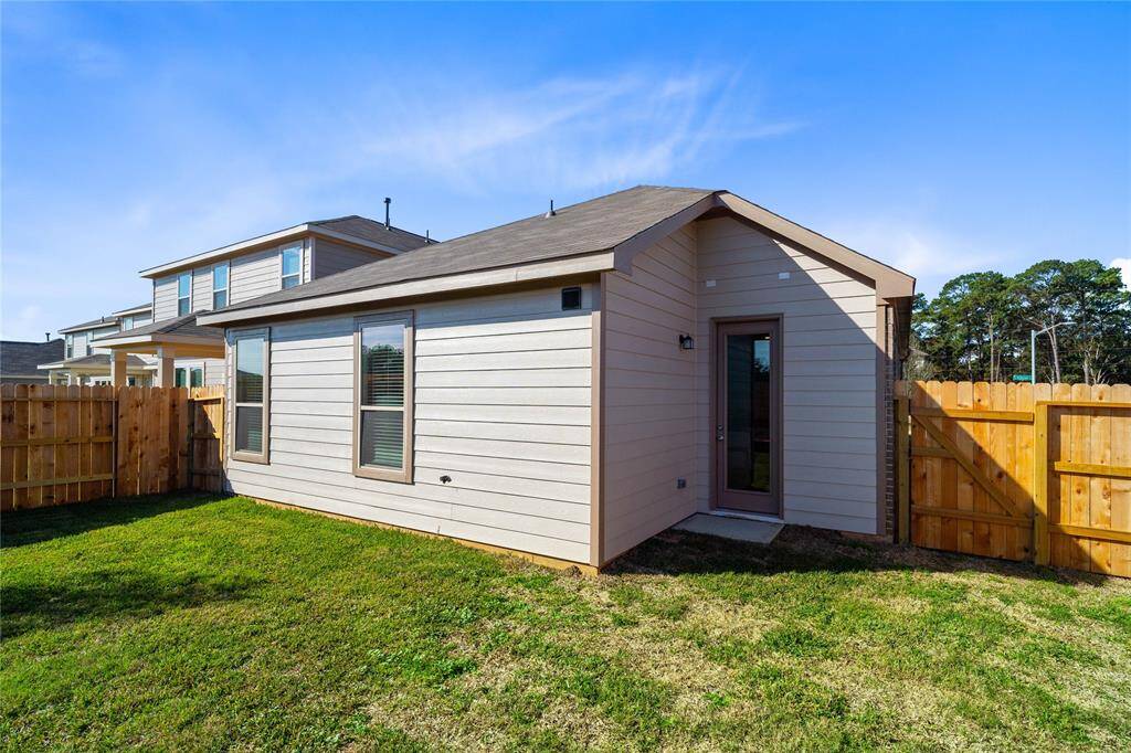 This backyard is enjoyable for everyone! From pets playing, kids jumping on the trampoline, or even having a garden, this amazing backyard provides space for endless activities for the whole family!