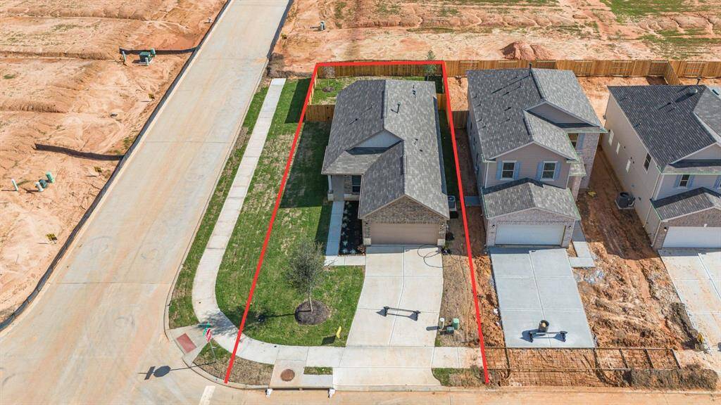 This home sits on a large CORNER lot with ample yard space in front and the back, lush landscaping and a well-maintained yard.
