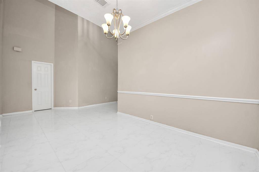 Dinning space near front entrance, kitchen and  1/2 bathroom
