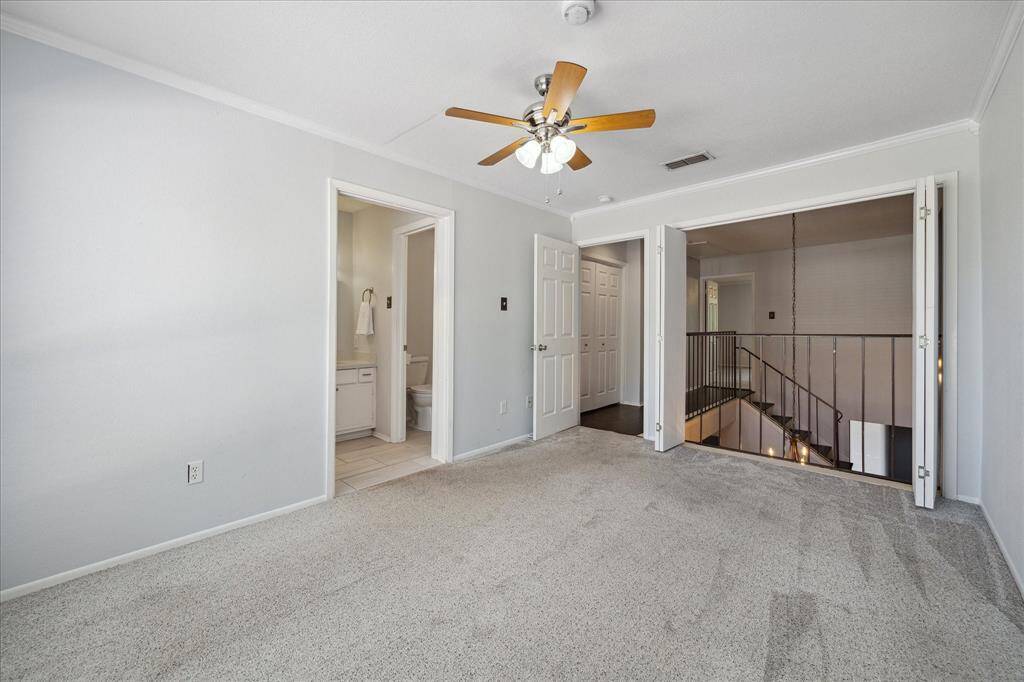Secondary bedroom-sliding doors can be open or shut to allow views of the stairwell for a more open atmosphere.