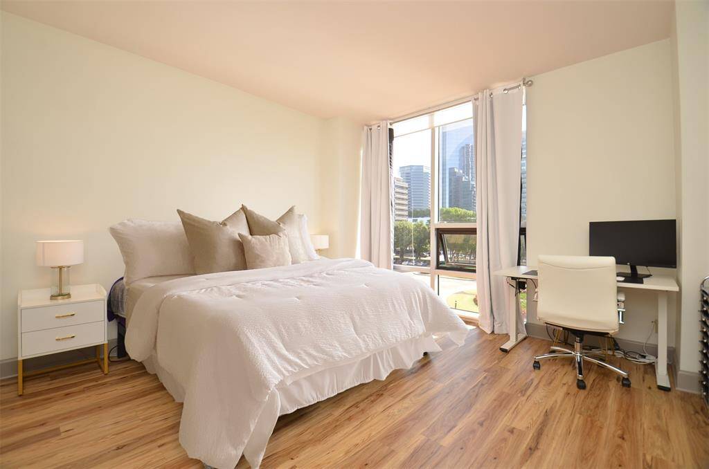 Light and Bright Bedroom that has an amazing view of the Galleria and Four Leaf Towers Garden