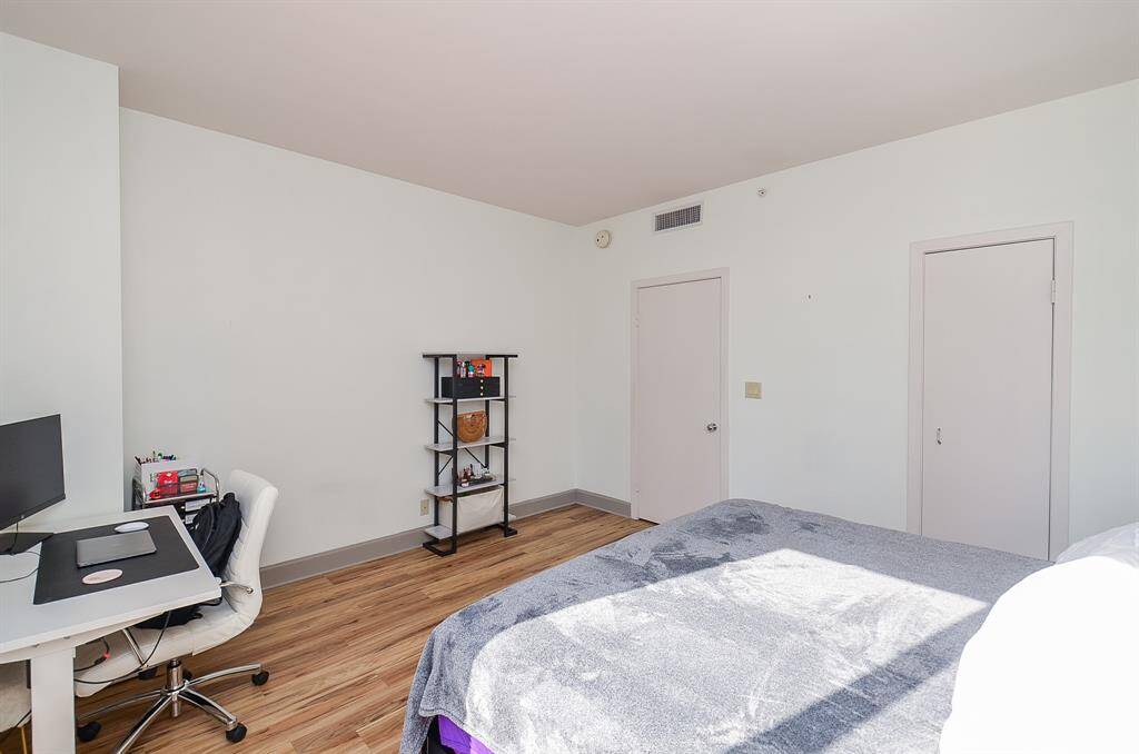 Another view of the sizable bedroom