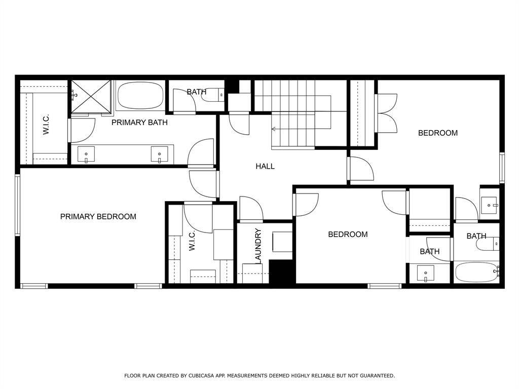 This floor plan features a primary bedroom with an en-suite bathroom and walk-in closet, plus two additional bedrooms, each with access to separate bathrooms. There's a central hall, a laundry area, and ample storage space. Ideal for comfortable family living.