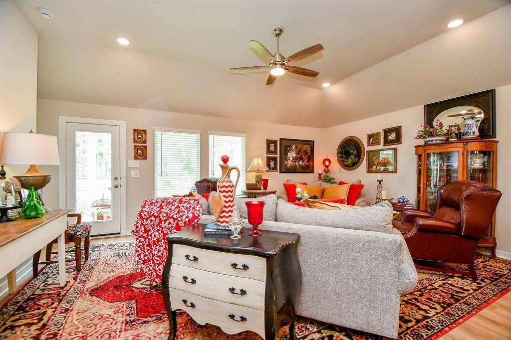 SPACIOUS FAMILY ROOM WITH SEVERAL FURNITURE ARRANGING OPTIONS SINCE THERE IS NOT A FIREPLACE IN THE WAY