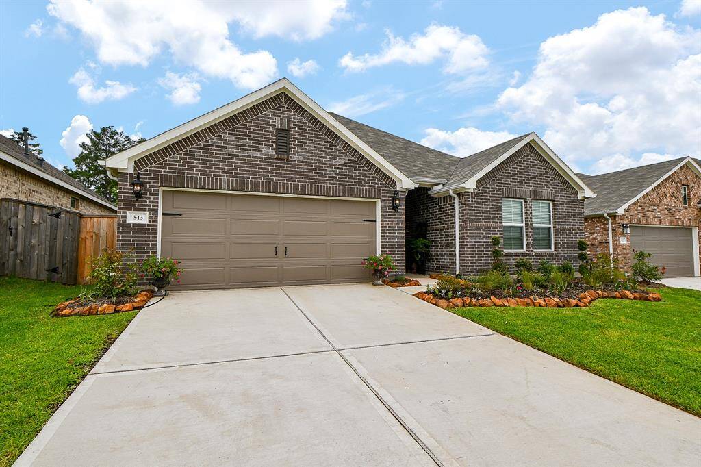 BEAUTIFUL HOME WITH PROFESSIONAL LANDSCAPING, ADDED TREES AND NEW OUTDOOR LIGHTING