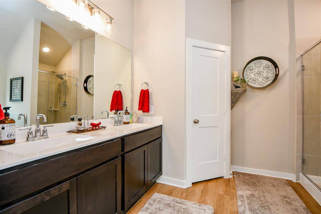 PRIMARY BATHROOM WITH DUAL SINKS, GARDEN TUB AND SEPARATE SHOWER