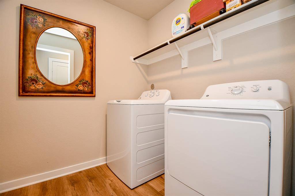 LARGE LAUNDRY ROOM TOO! WASHER AND DRYER STAY WITH THE HOUSE BUYERS WANT THEM!