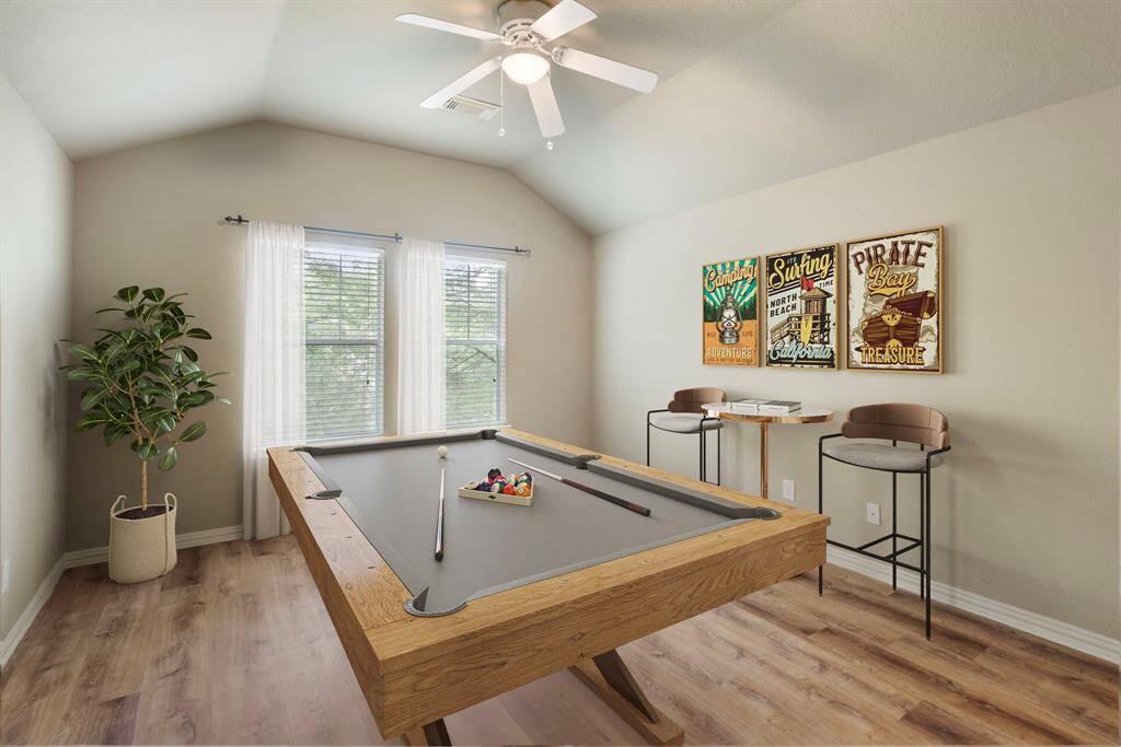 ~virtually staged represented photo~ two primary bedrooms. Ensuite with private baths. Larger one could be used as game room!