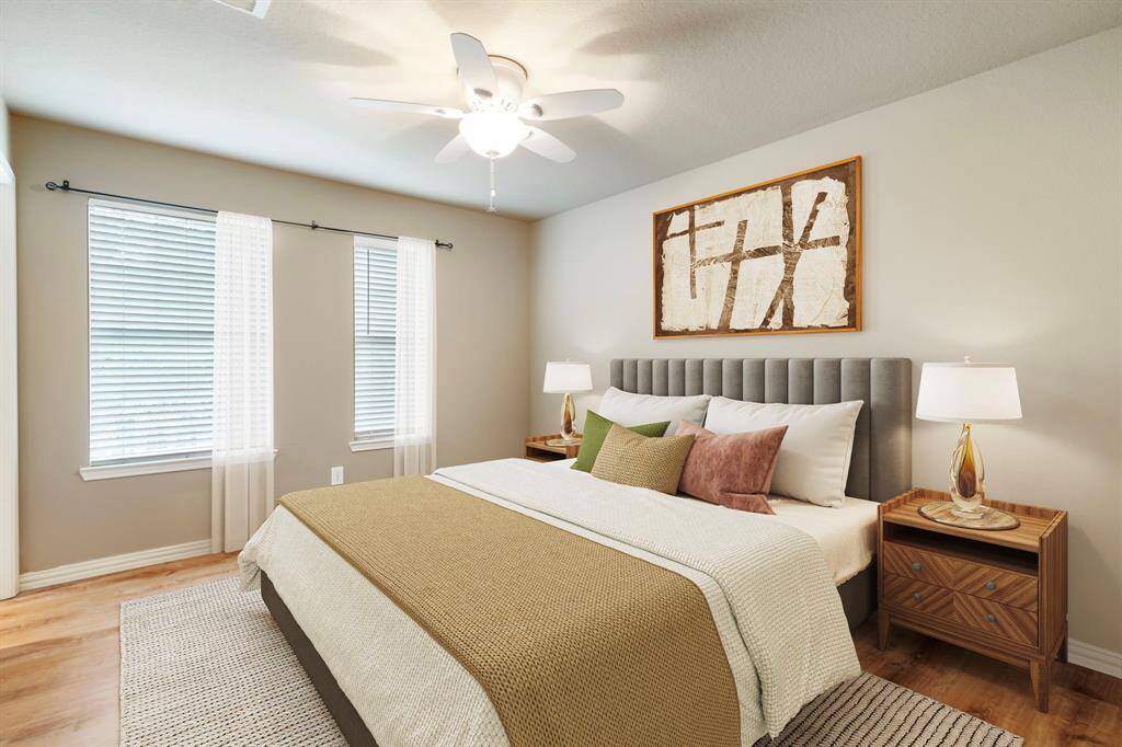 ~virtually staged represented photo~ two primary bedrooms. Ensuite with private baths.