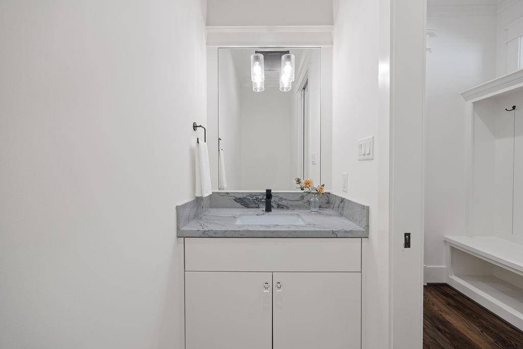 This powder bath is private, polished, and ready for your cutest guest towel.