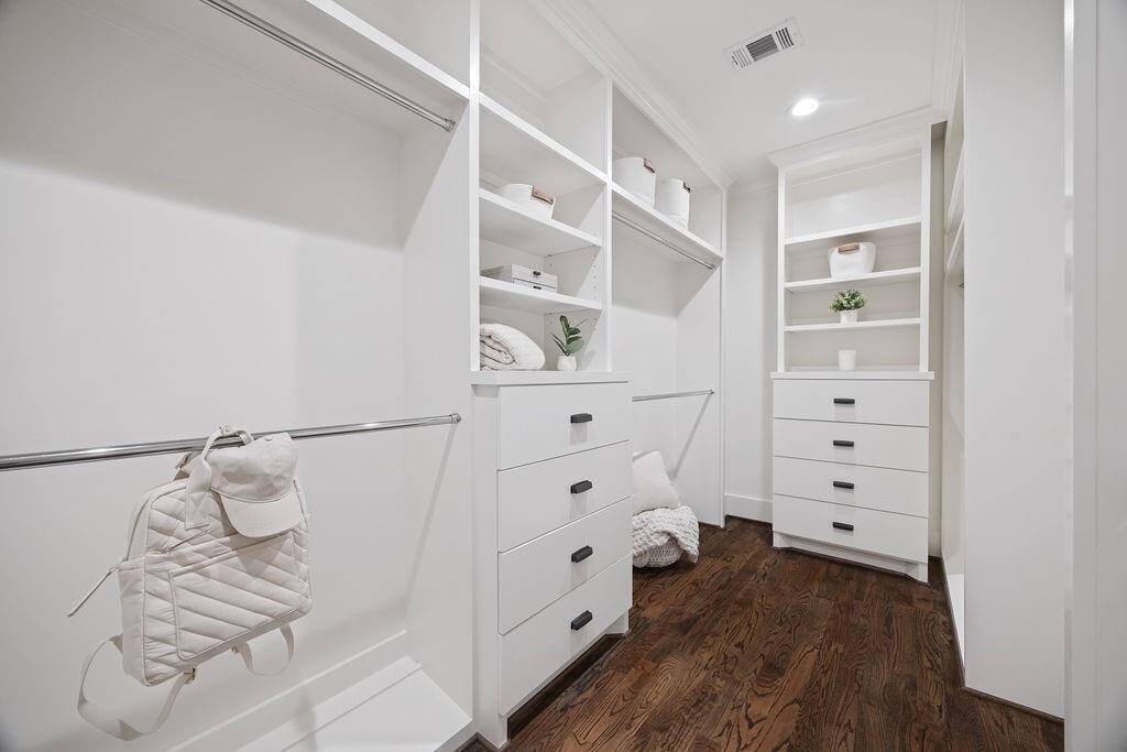 Another view of the expansive primary closet, thoughtfully designed with ample storage and a layout that makes use of every inch.