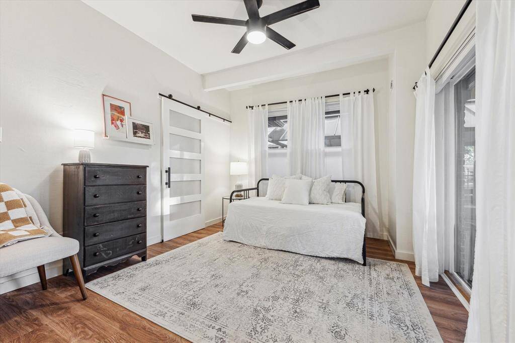 Secondary bedroom - A generously sized bedroom with direct access to bathroom and front lawn.