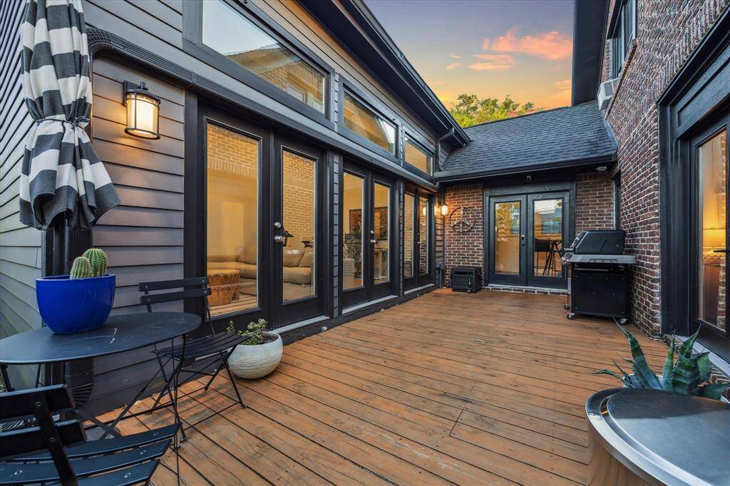 A back patio deck offering an extended area for hosting off kitchen and living!