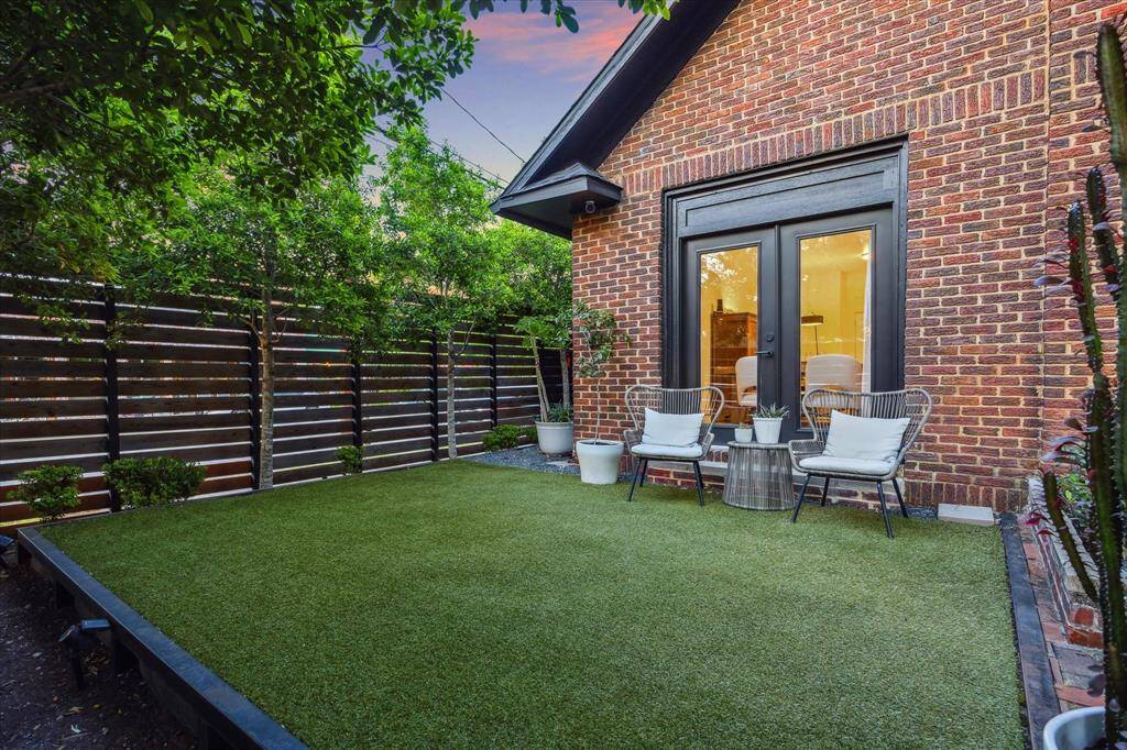 A great outdoor space with fully fenced yard, automatic gate, stone driveway with carport and multi use storage shed.