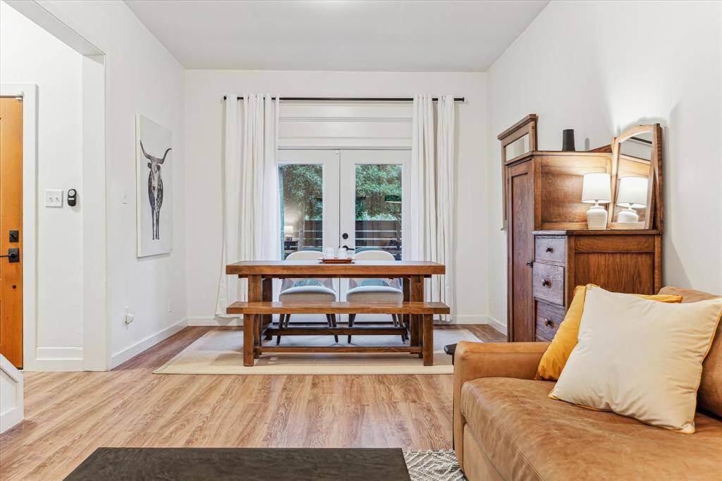 Alternate view of current dining area. A perfect open dining area for hosting and holiday dinners.