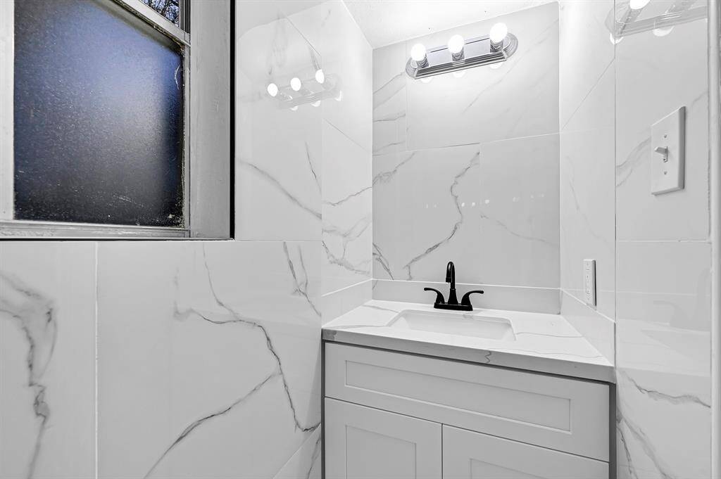 Half Bathroom next to laundry