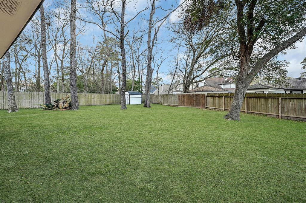 Huge backyard with shed