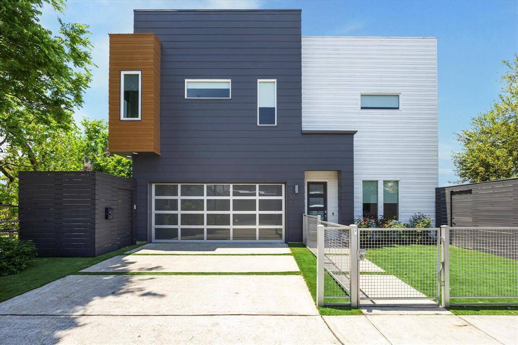 Striking 10,000 sq. ft. modern masterpiece with sleek lines, grand entrance, and stunning contemporary curb appeal.