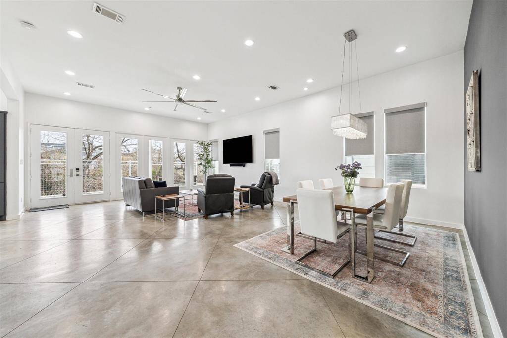 Spacious living/dining area with stylish finishes, warm ambiance, and a seamless flow for entertaining.
