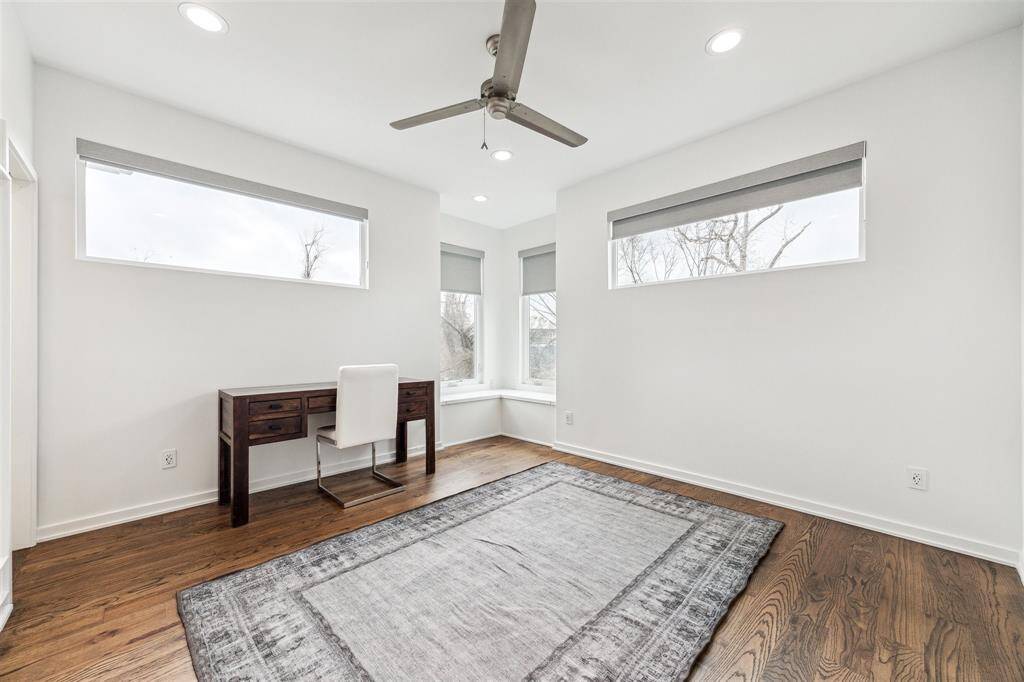 Inviting bedroom with sleek new room darkening shades, ensuring privacy and a peaceful atmosphere.