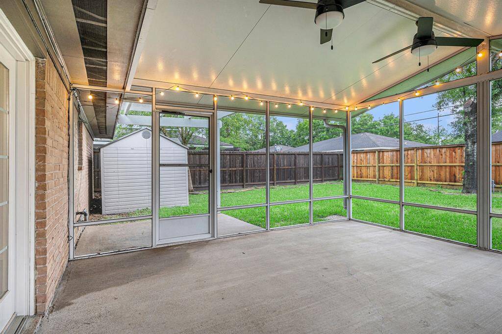 Screened patio with two ceiling fans and string lights. Nice to sit outside with the air moving and not get away from the mosquitos!