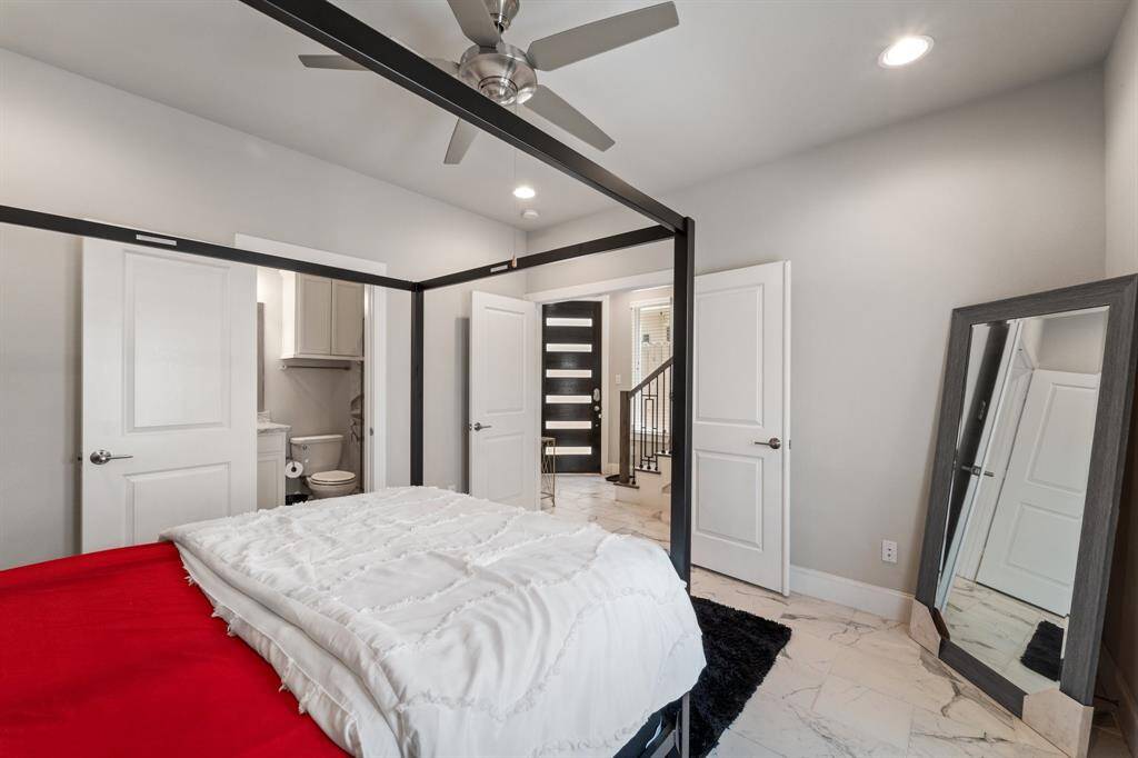 Entry leads to the stairs taking you to the second floor on the left. To the right you have a bedroom.