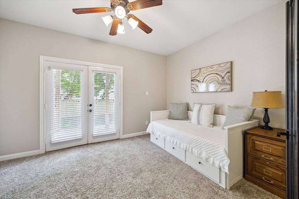 Lovely double doors lead out to your back covered patio and spacious yard.