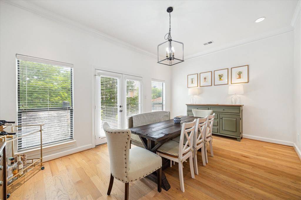The dedicated dining room is located on the second floor. The airy double doors here lead out to the second floor roomy balcony.