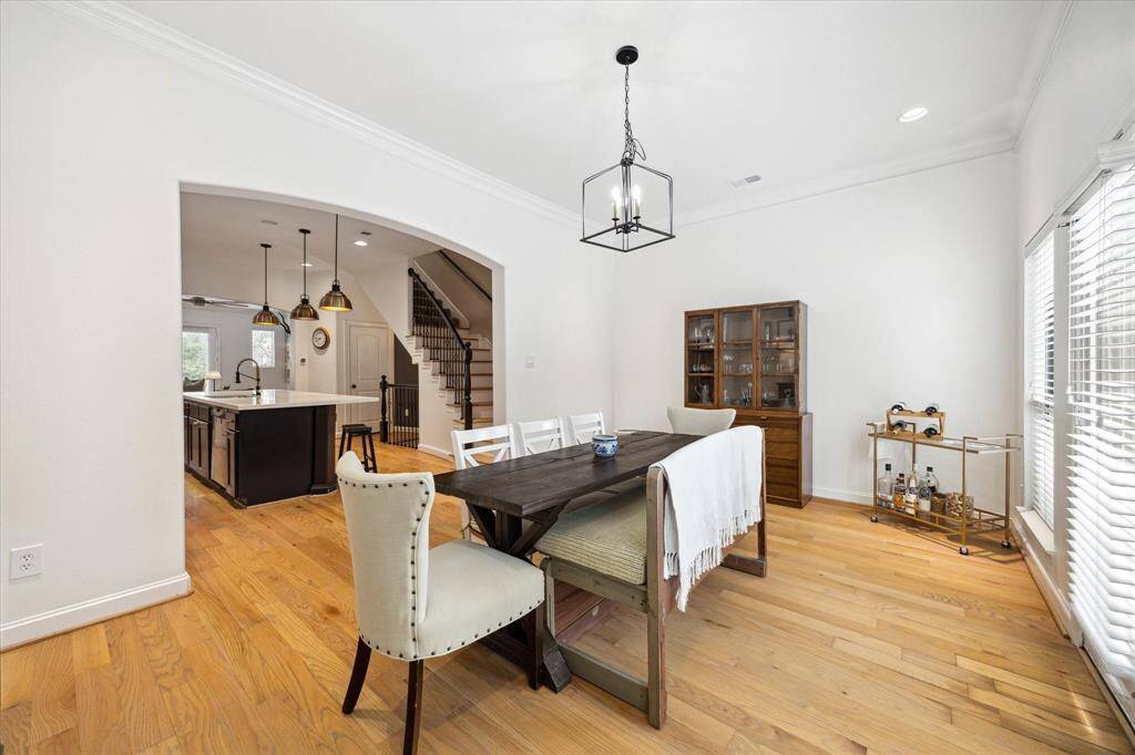 The dining room flows into the kitchen, ideal for family dining or entertaining.