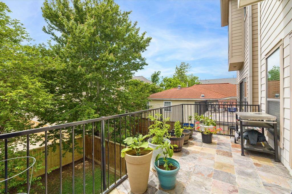 Enjoy morning coffee and evening cocktails on this spacious balcony off the dining room.