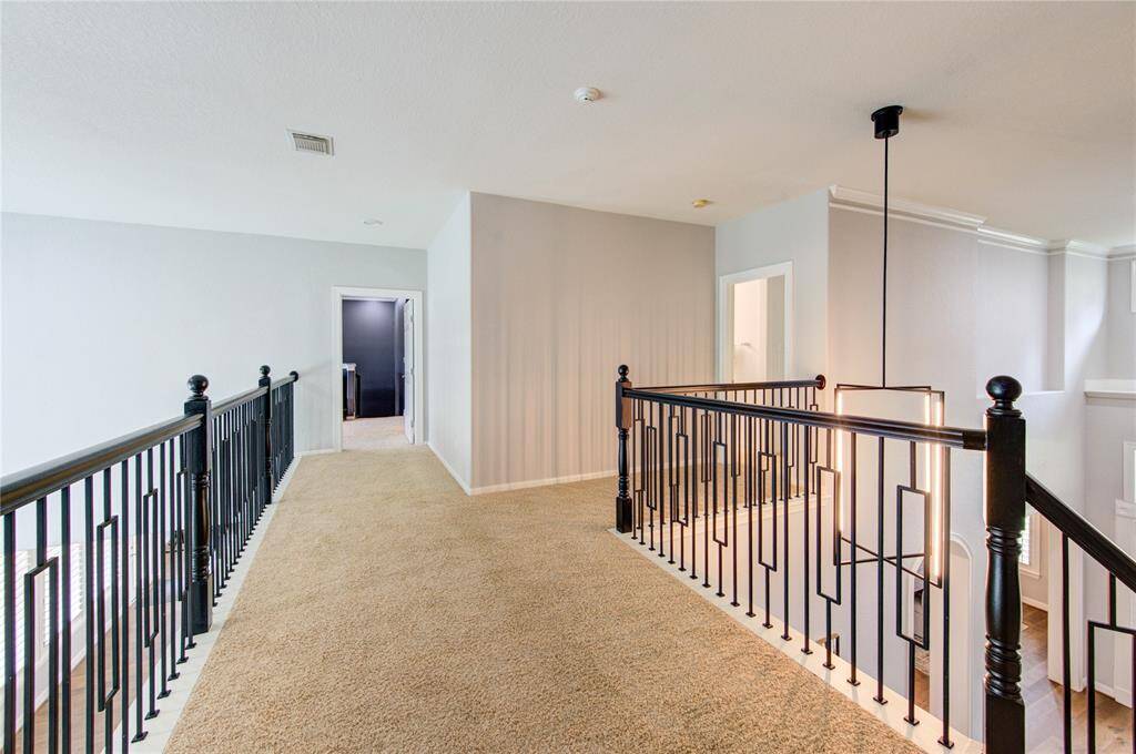 Spacious upper landing with upgraded railing