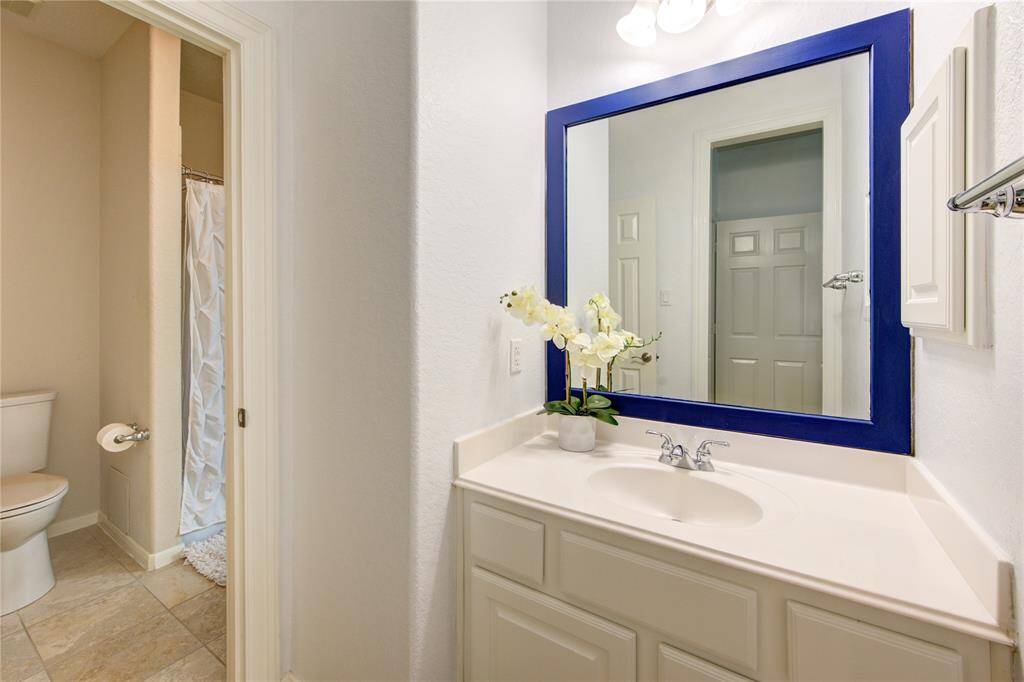 Elegant bath connected to a spacious secondary suite