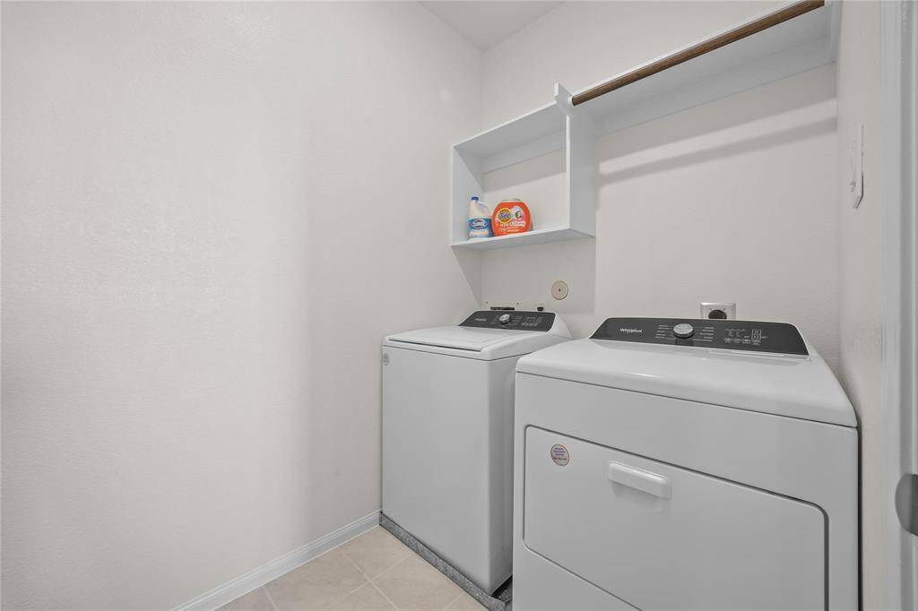 This is a bright, functional laundry room on the 2nd floor.