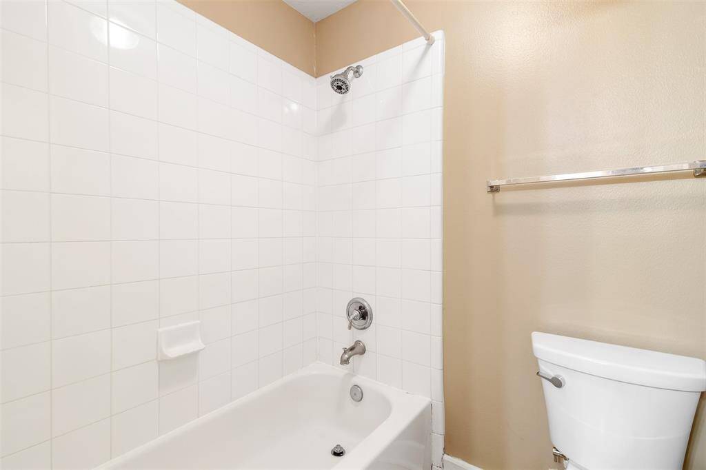 View of tub/shower combo.