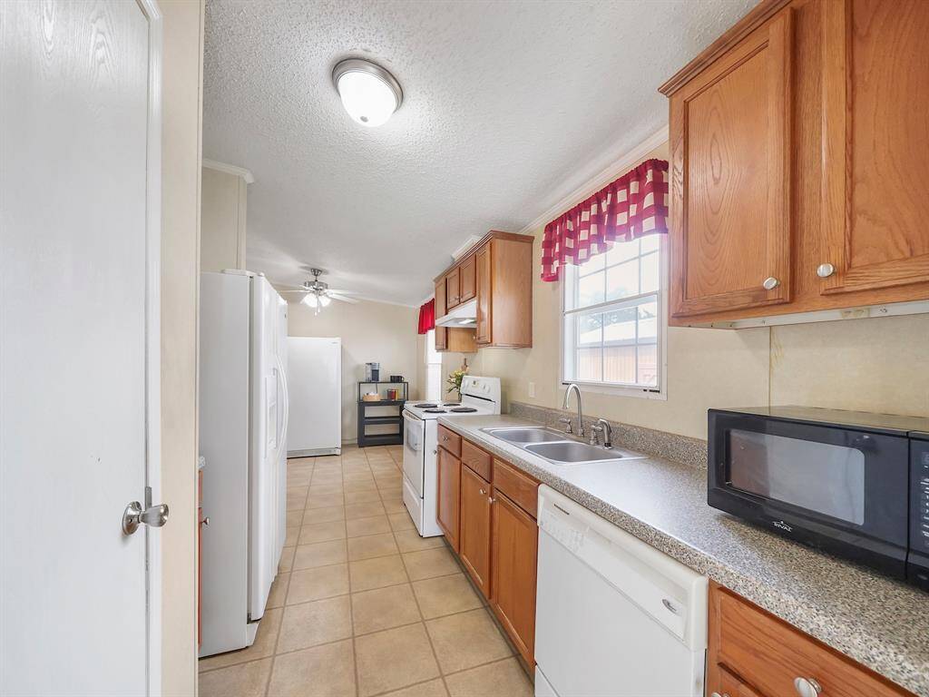 Another view of the kitchen