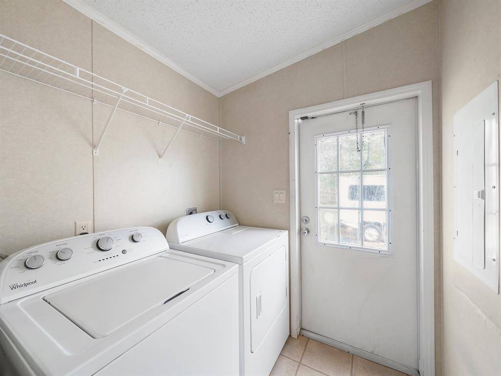 Utility room leading to the backyard