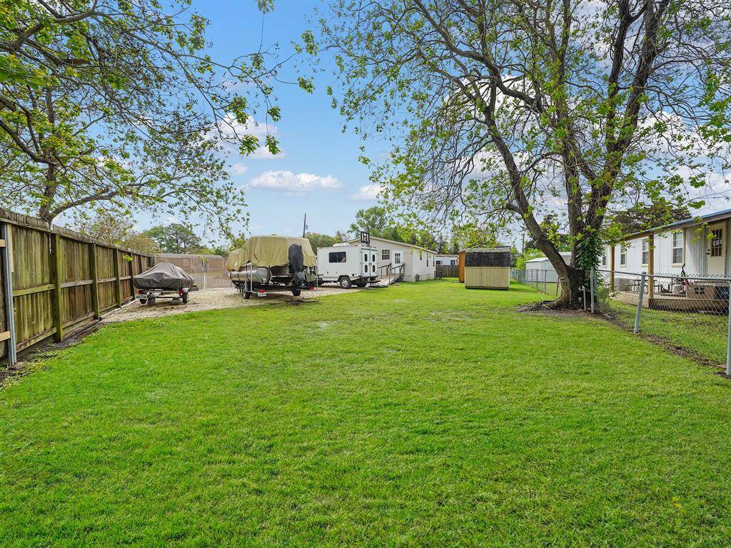 Sitting on approximately 12,753 this lot has plenty of space for entertaining or storage