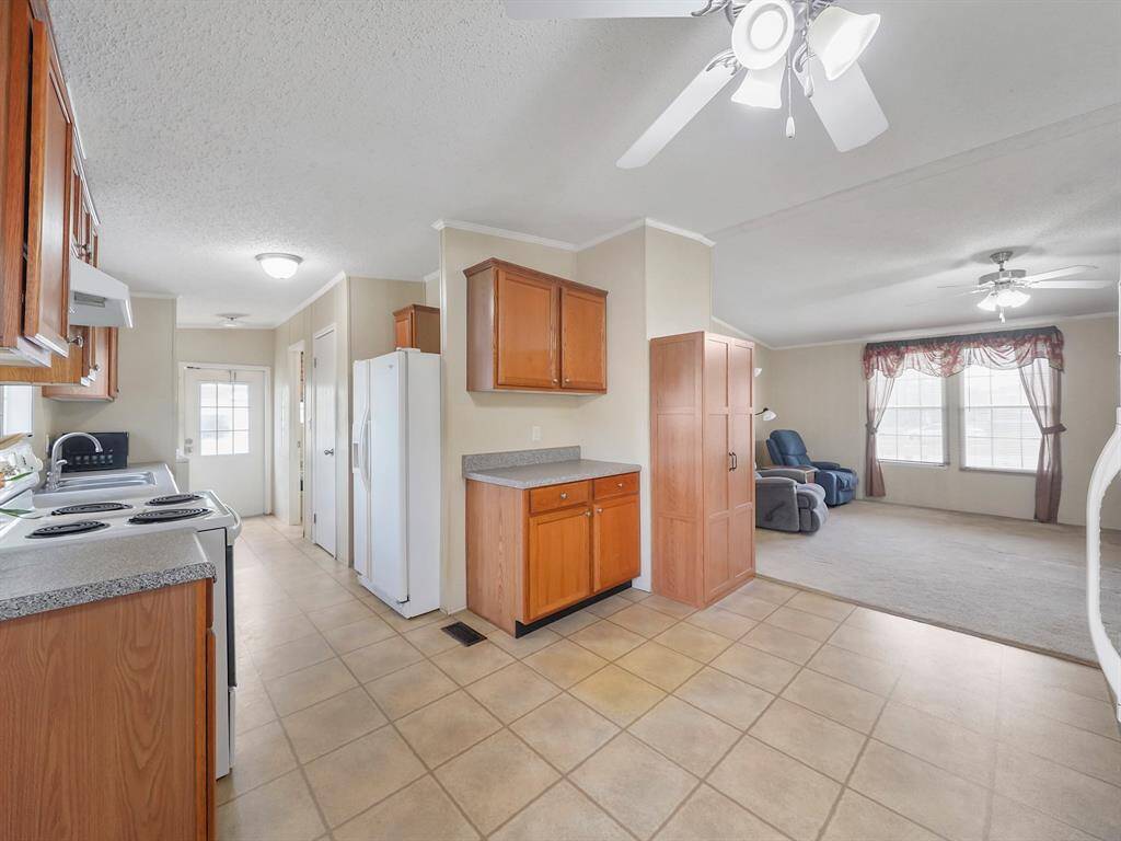 Dining room opens to living area allowing for the whole family to be involved