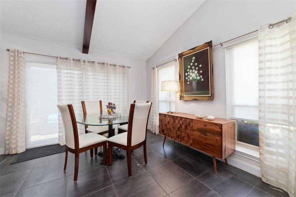 This main dining area can host with its generous size and beautiful natural lighting.