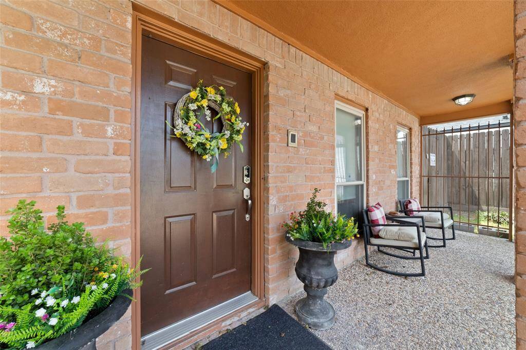 Charming covered front porch with space to relax or greet guests. This shaded entry spot sets the tone for the home's peaceful vibe.
