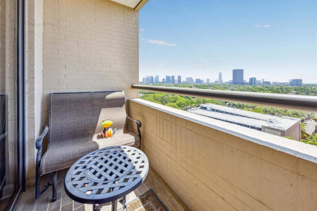 The balcony offers bright, sun-filled views—an ideal spot for morning coffee or unwinding at sunset.