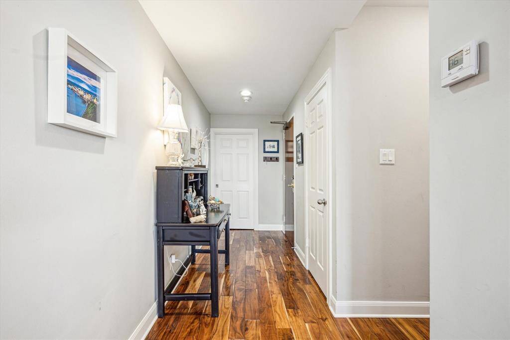 A spacious entryway welcomes your guests, complete with a generous coat closet for added convenience.