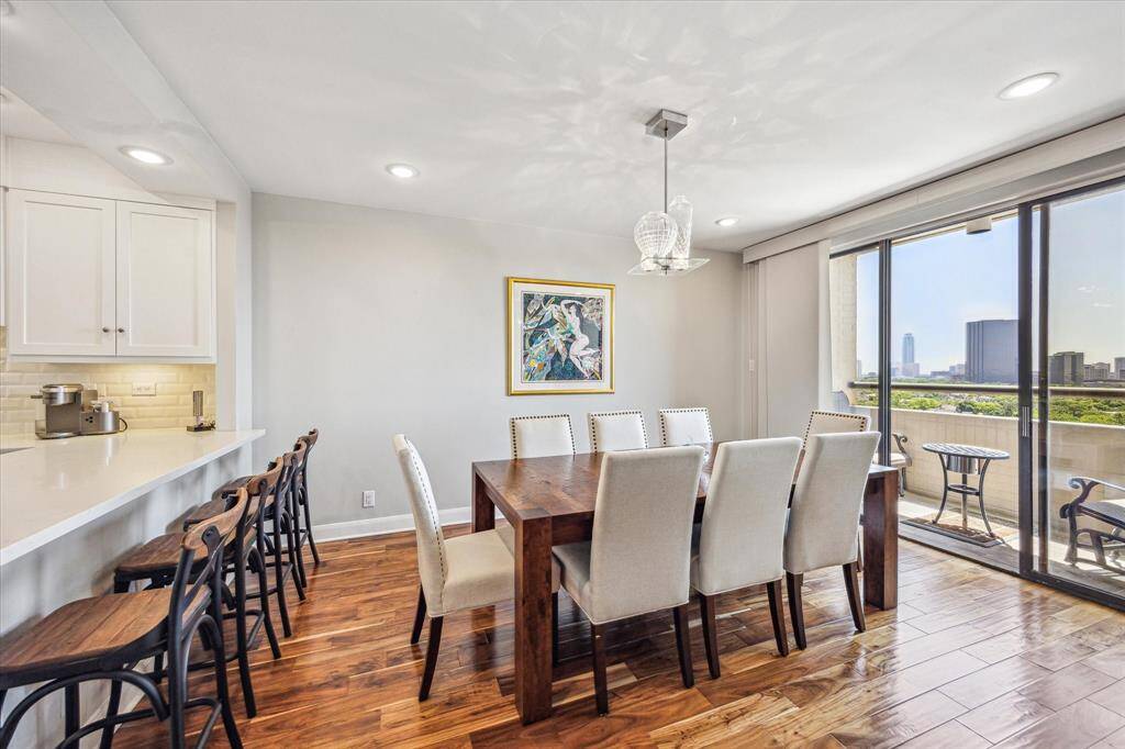 Seamlessly connected to the open kitchen, the large dining area is ideal for entertaining, while the generous bar easily accommodates four stools for casual dining or conversation.